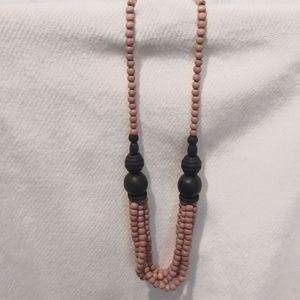 Vintage 1960's black and tan wooden beaded necklace